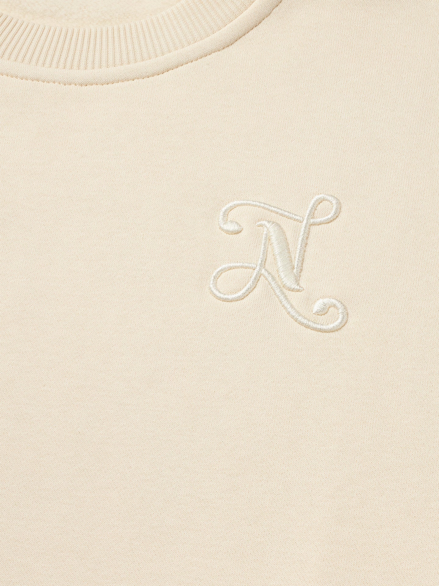 NIKKIE Swirl Sweater